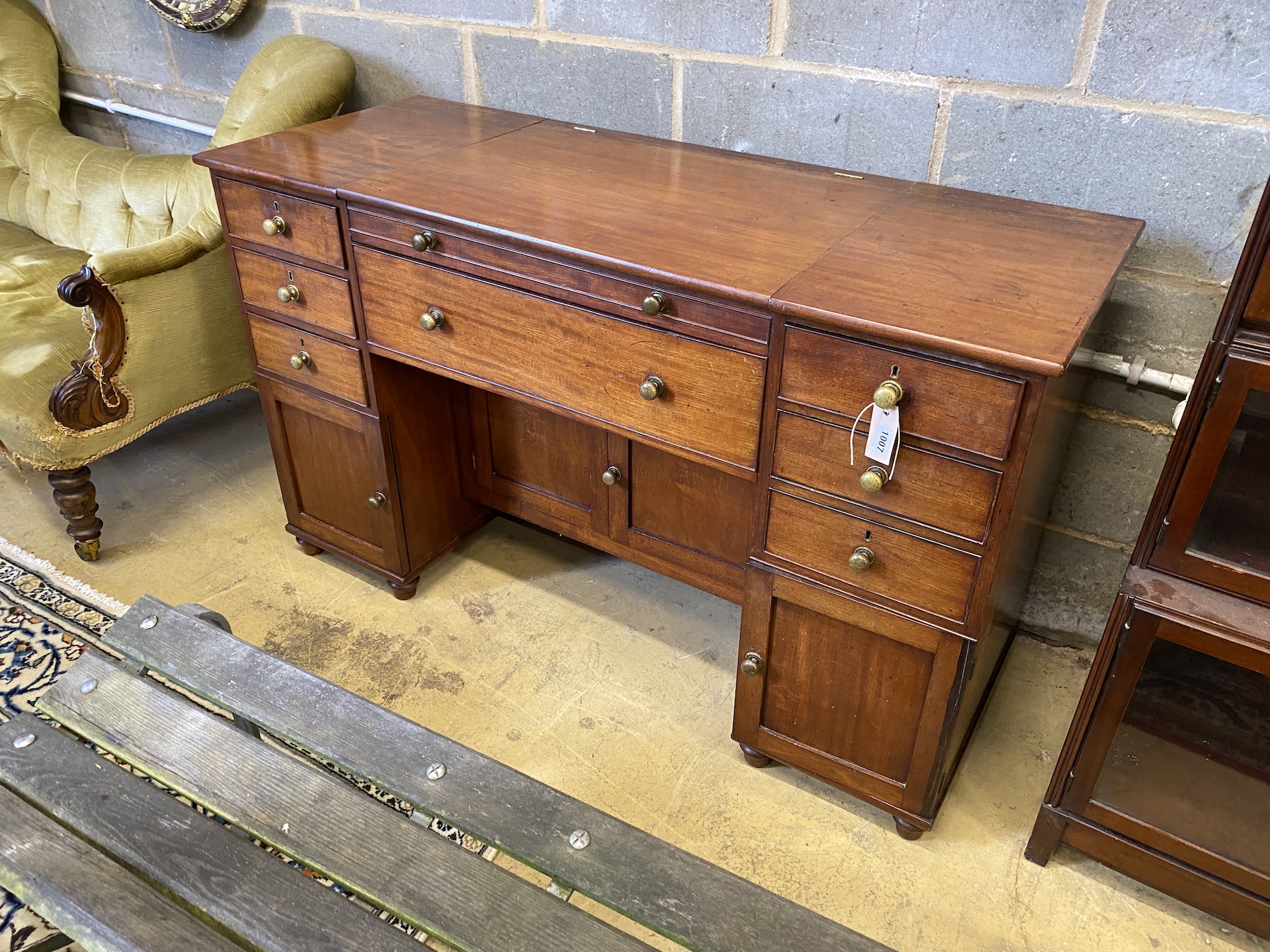 An Edwardian George III style mahogany enclosed washstand, width 132cm, depth 51cm, height 80cm